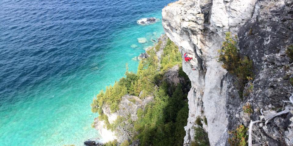 A Climber on the Lion's Head Lookout Cliff Faces